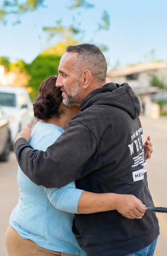 Two people hugging